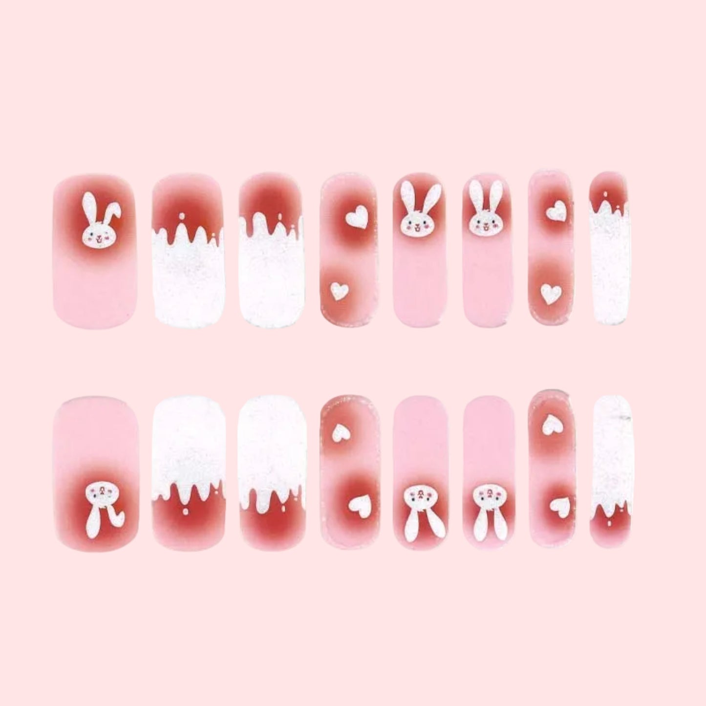 Set of nail art stickers with bunny and heart designs on a white background