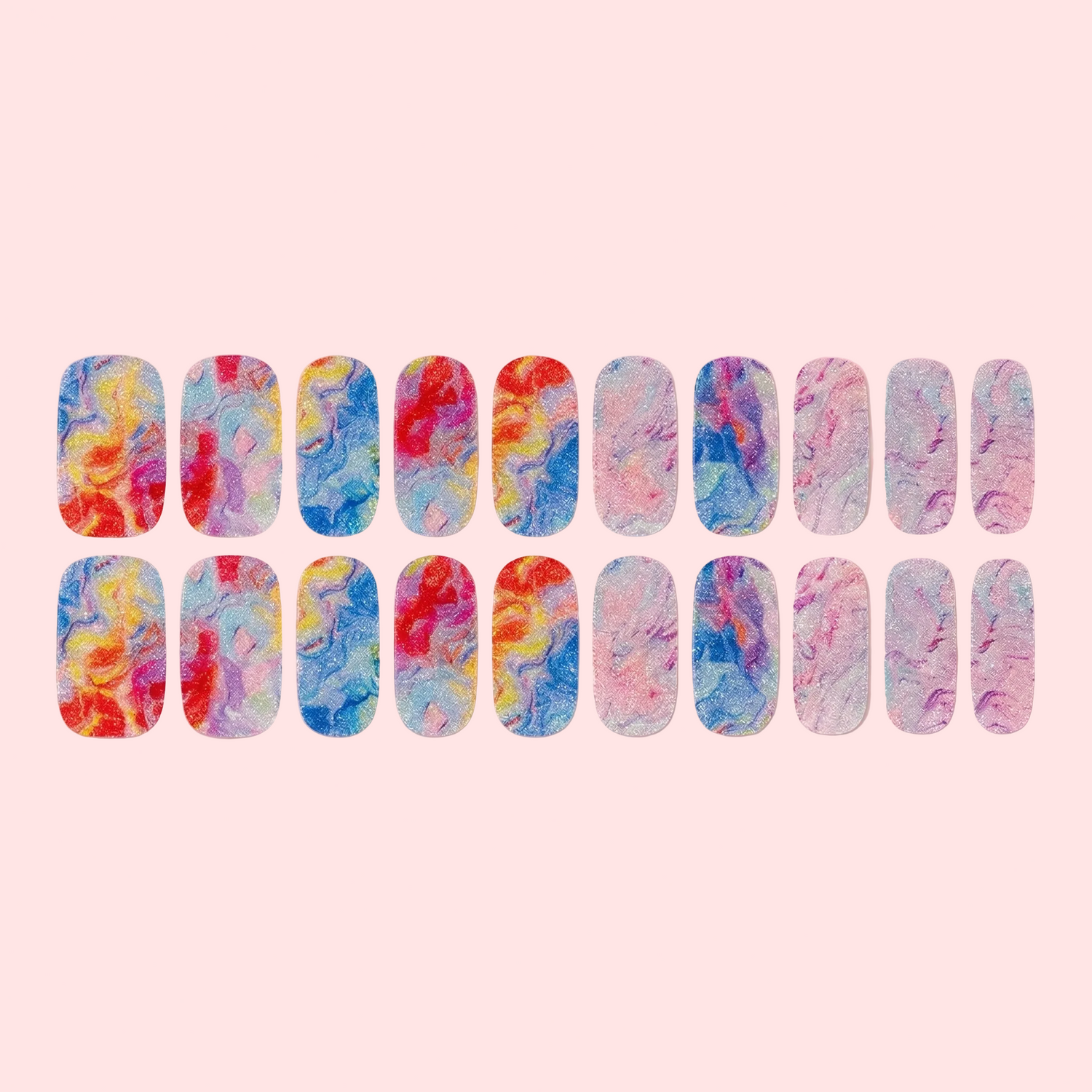 Set of colorful nail art stickers on a pink background
